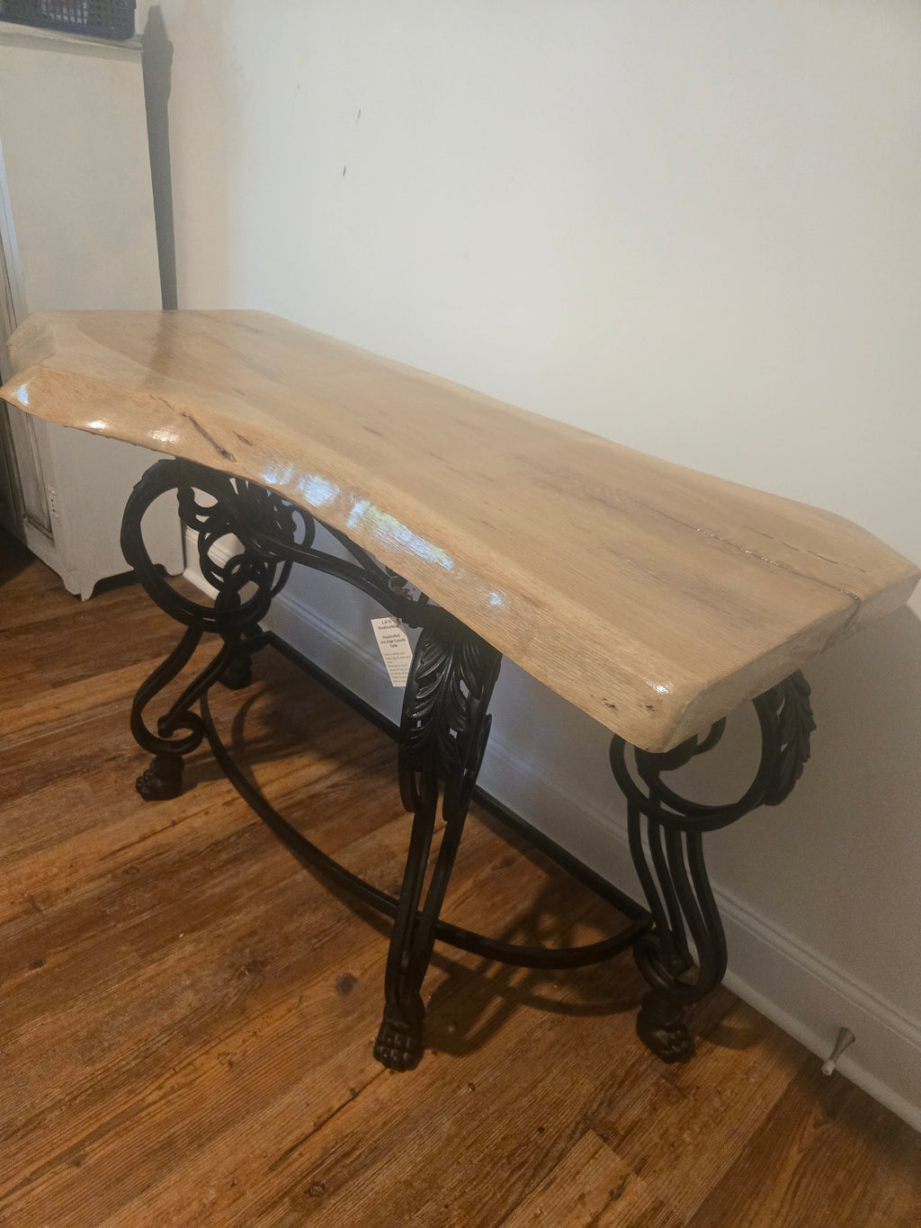 Elegant Live Edge Console Table with Ornate Black Iron Base