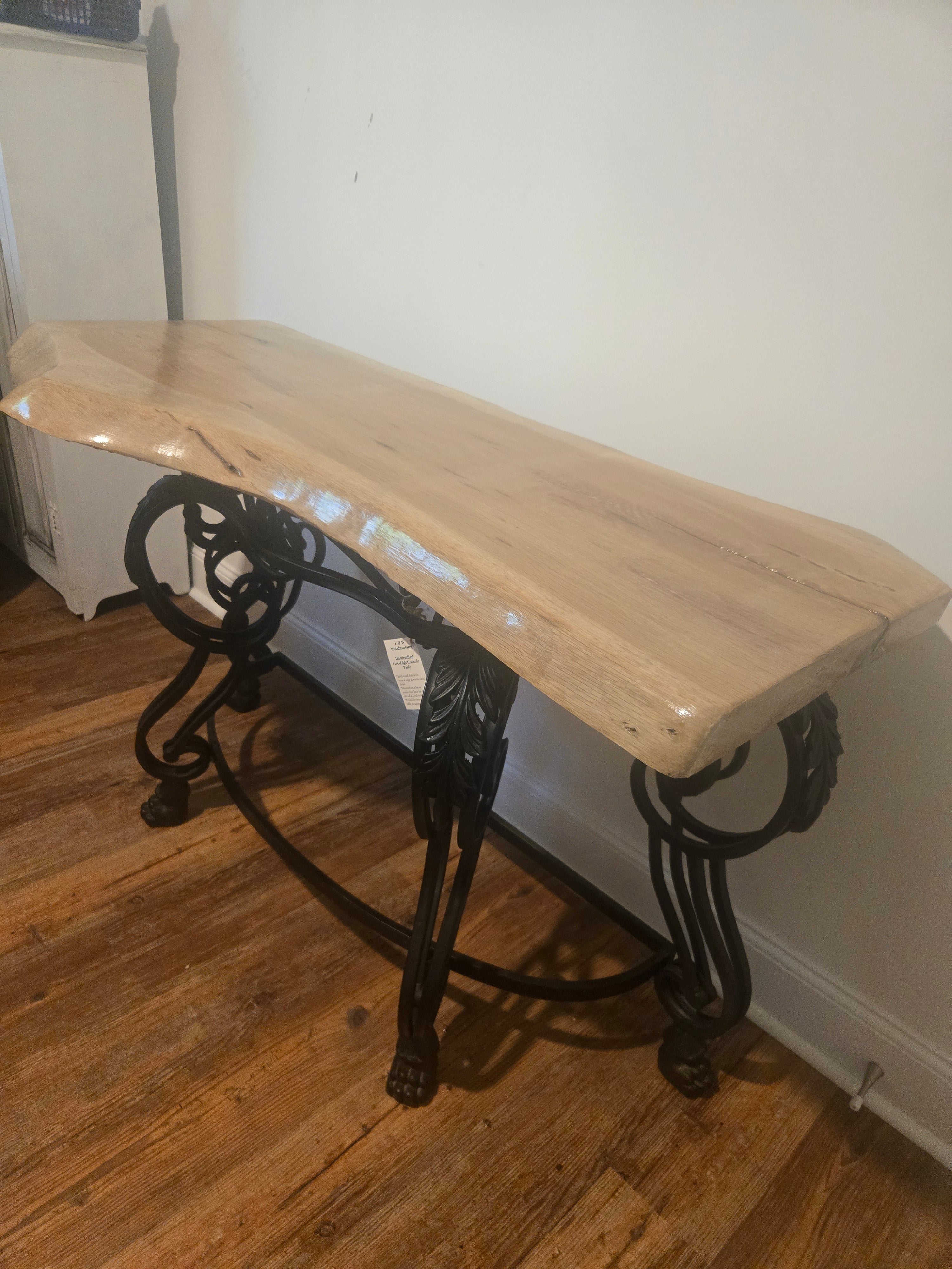 Elegant Live Edge Console Table with Ornate Black Iron Base