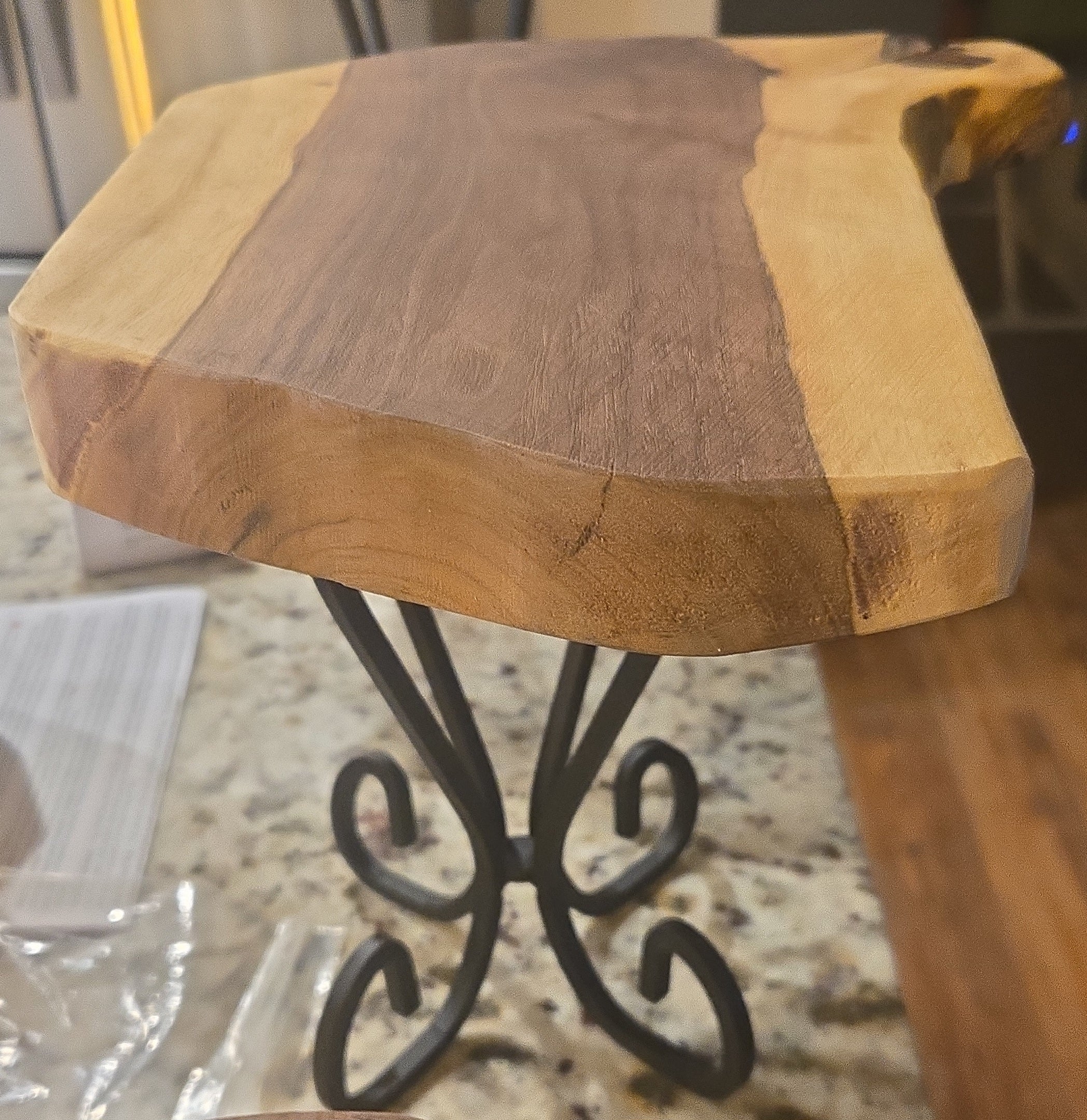 One-of-a-kind live edge black walnut riser.